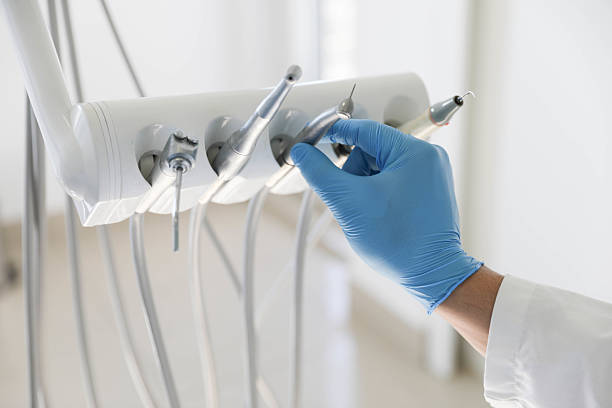 Professional Tooth Extraction technician working in South Laurel, MD
